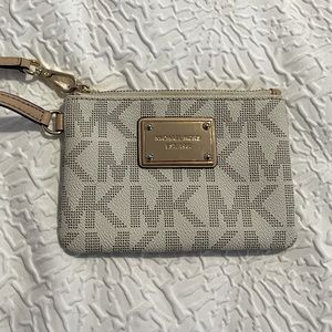 White peddled leather Micheal kors wristlet